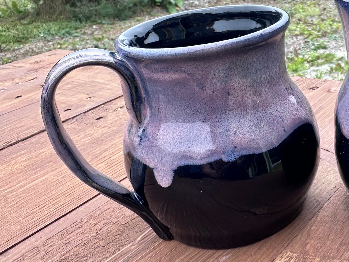 Studio Piece 017 fired mug, Obsidian with Sangria rim and upper exterior