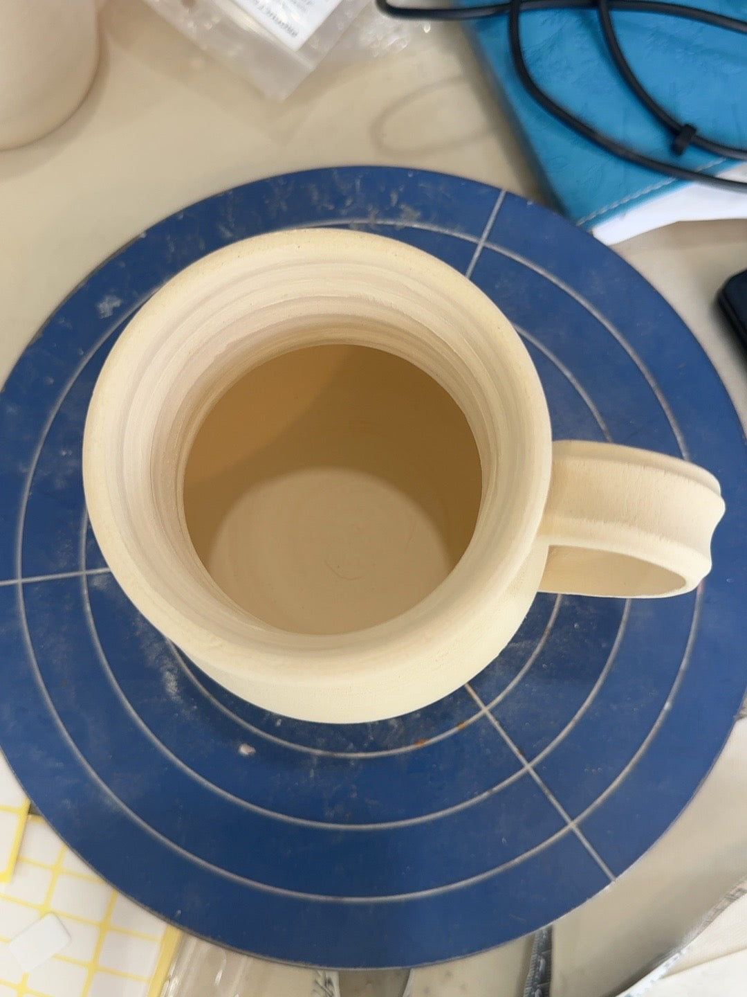 Studio Piece 017 bisque mug rim and interior