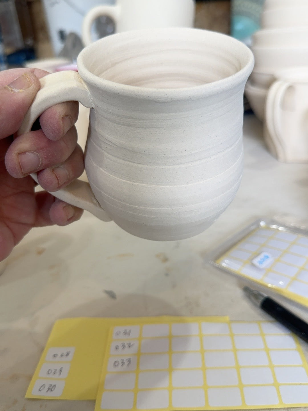 Studio Piece 022 bisque mug handle grip and profile