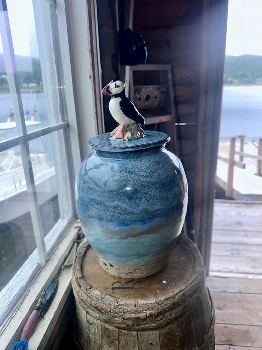 The Cove Sentinel handmade blue-green stoneware puffin lidded jar by Hatchet Cove Pottery